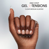 Close-up of a model's hand wearing Salon Perfect  307 Gel X-Tensions Clear Medium Almond.
